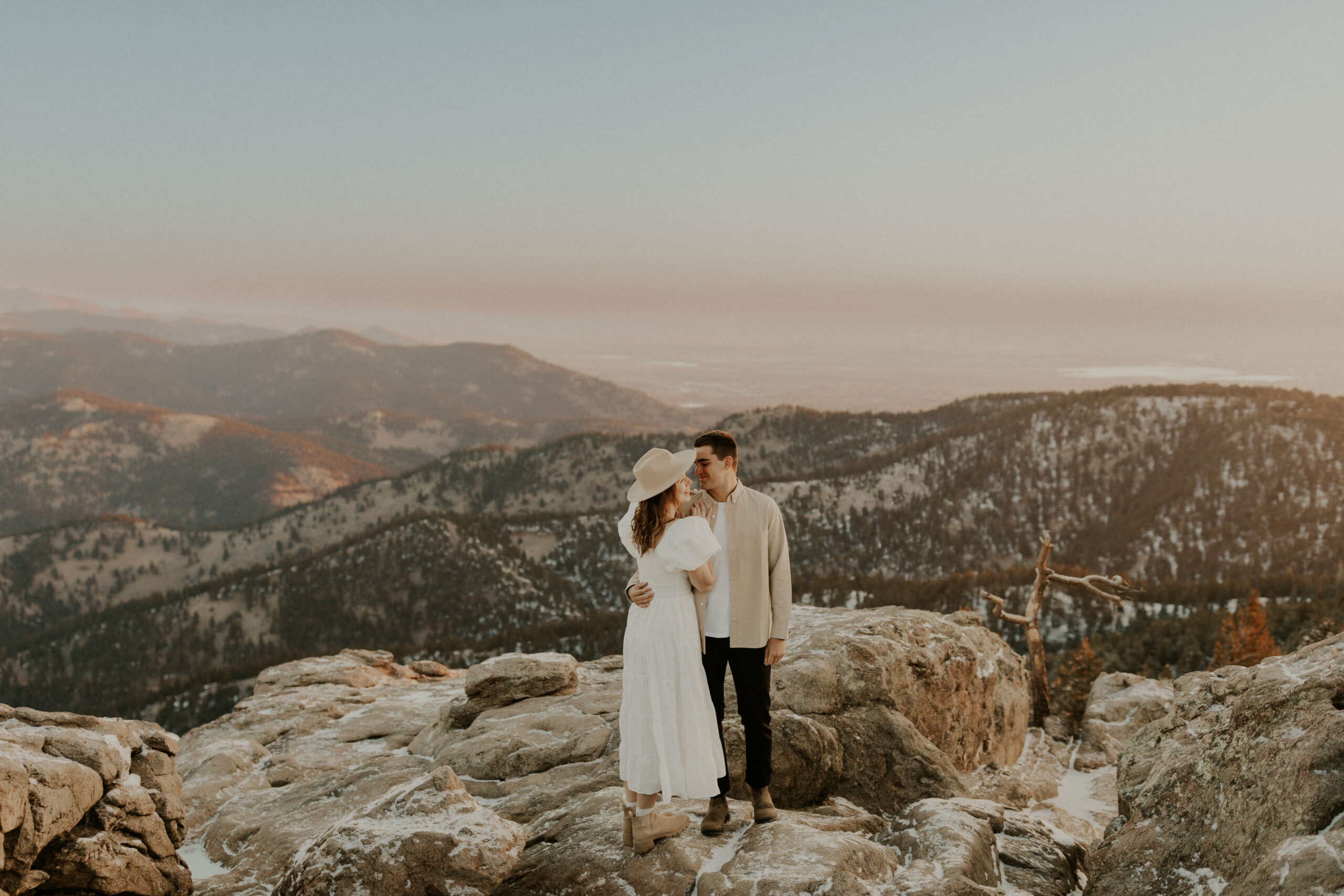An intimate sunrise engagement session at a mountain overlook in Boulder, Colorado.