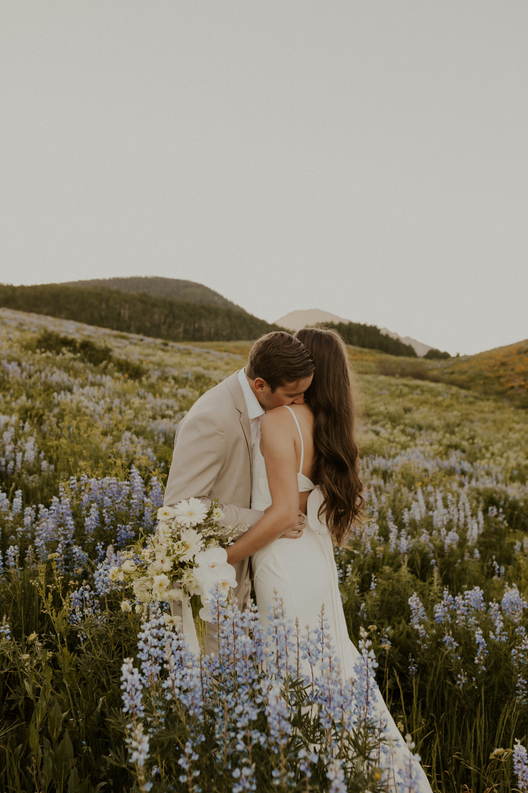 Keely and Jackson's timeless romantic elopement amongst the wildflowers in Colorado's mountain town Crested Butte.