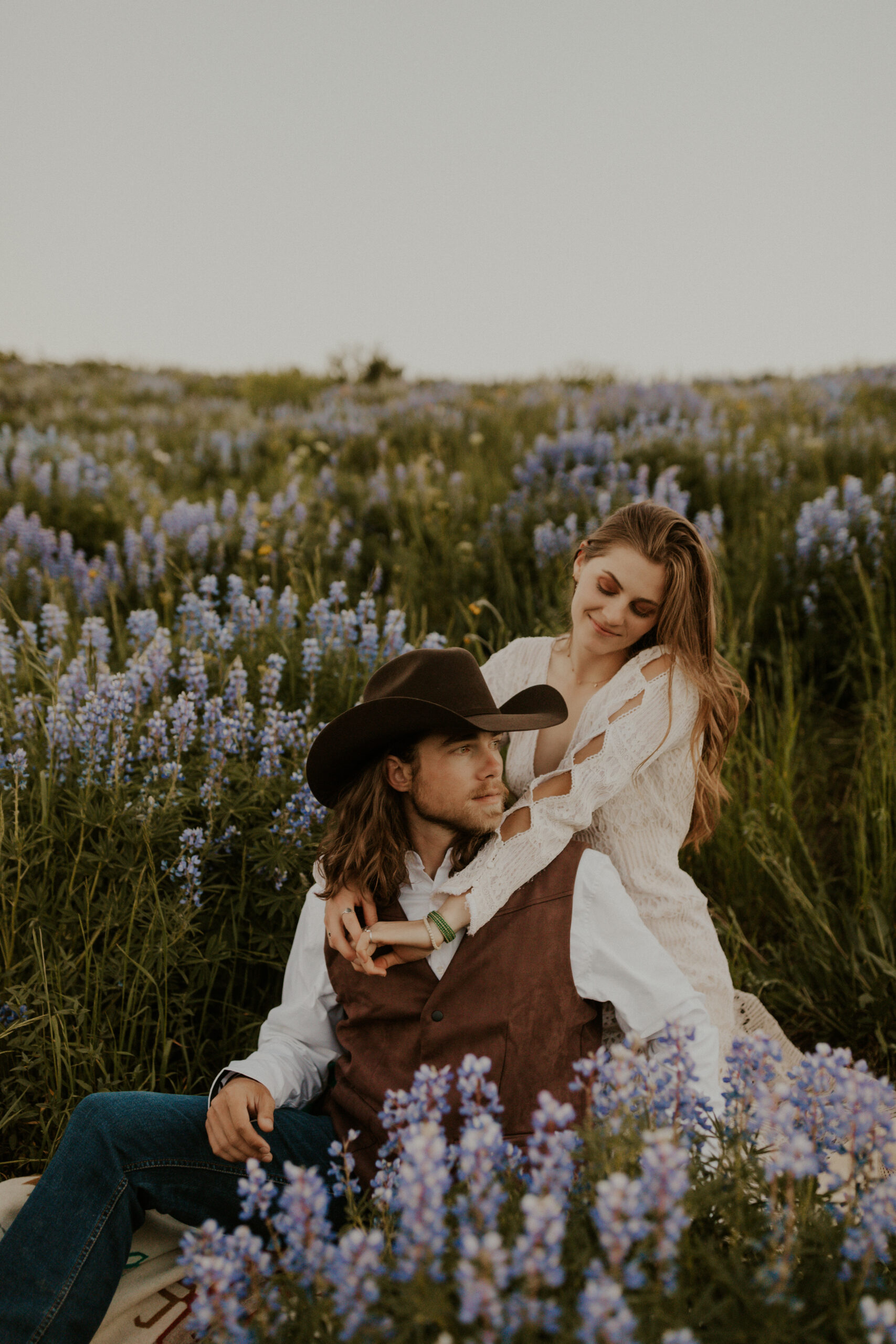 Western elopement in Crested Butte, Colorado with wildflowers and horses.