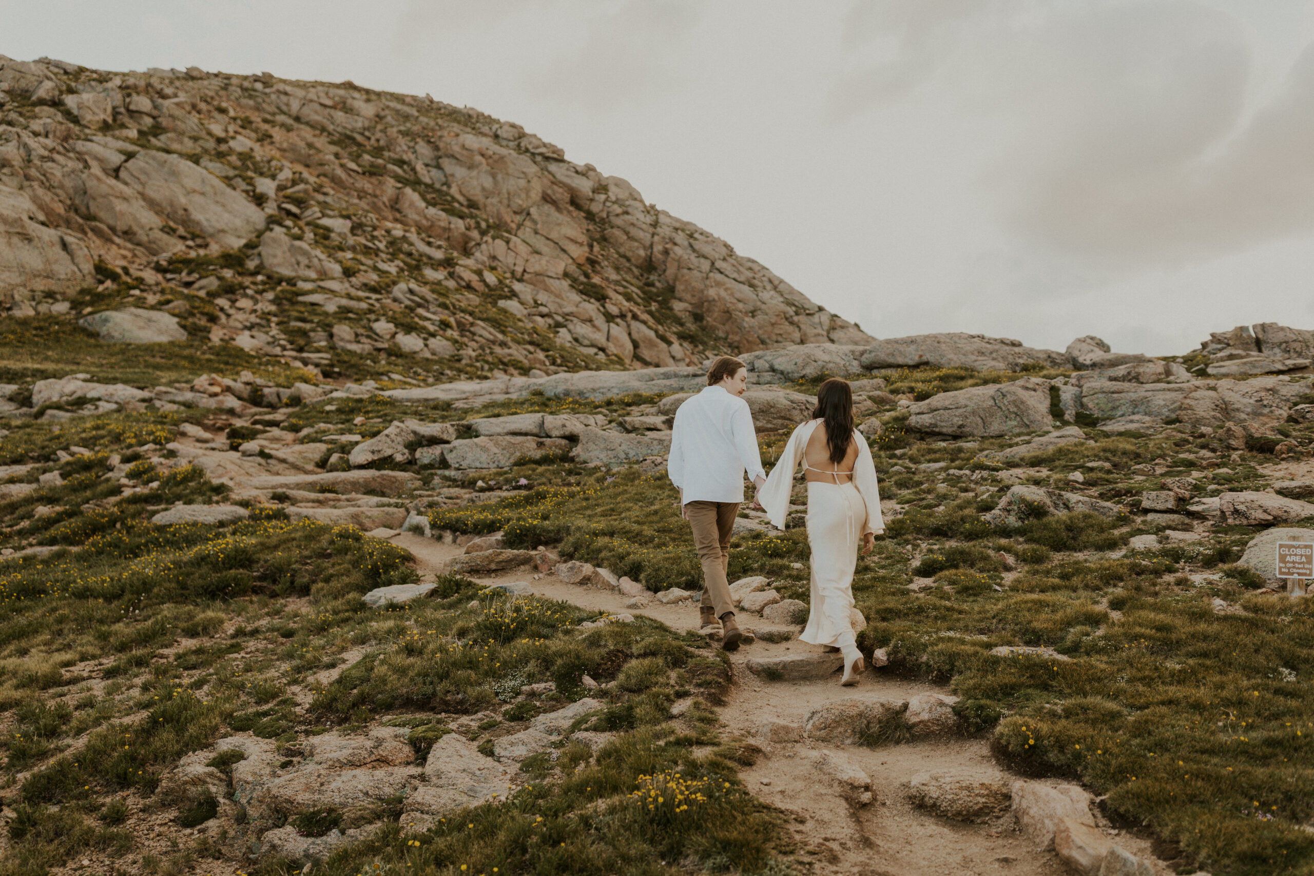 Sara + Josh's intimate summertime sunset elopement atop one of Colorado's iconic 14ers, Mount Blue Sky. It was such a beautiful, romantic evening.