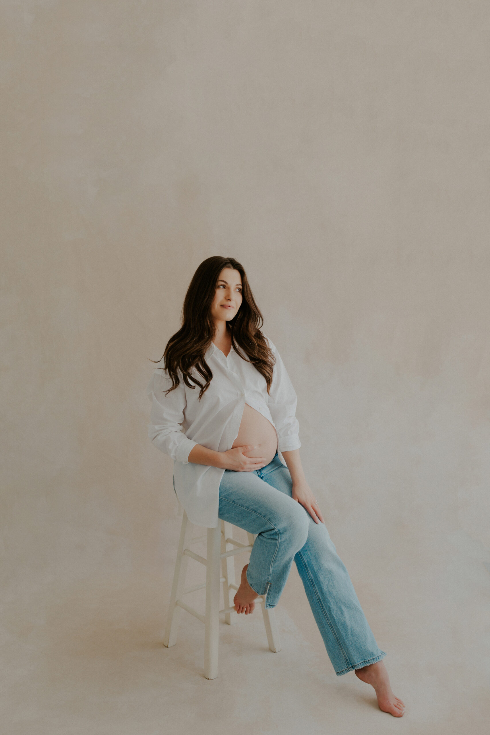 Timeless and romantic studio maternity session in Denver, Colorado for first time mom