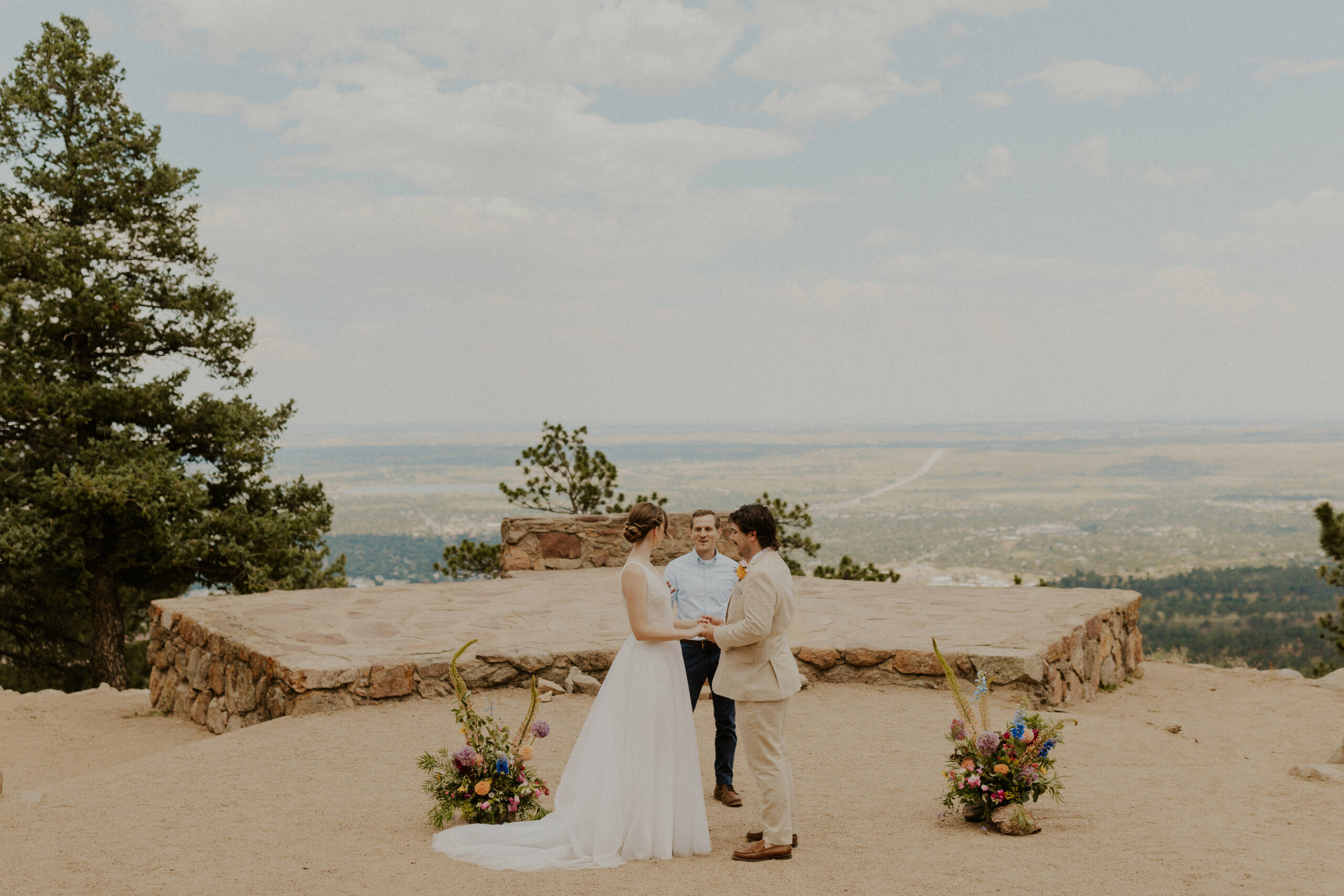 Intimate wedding at stunning outdoor venue Sunrise Amphitheater in Boulder, Colorado