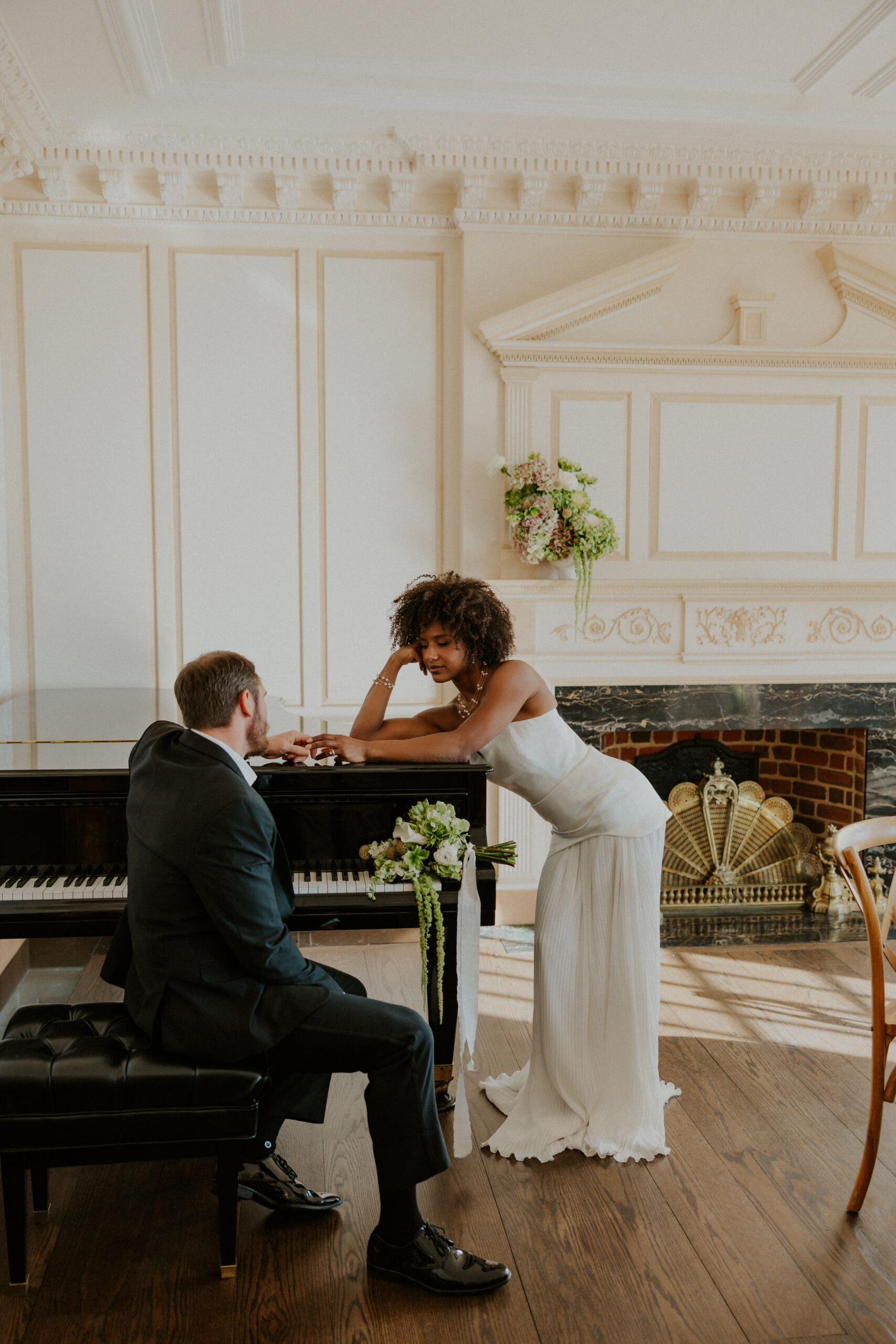 Elegant indoor wedding portrait by the piano at Virginia's Estate at River Run