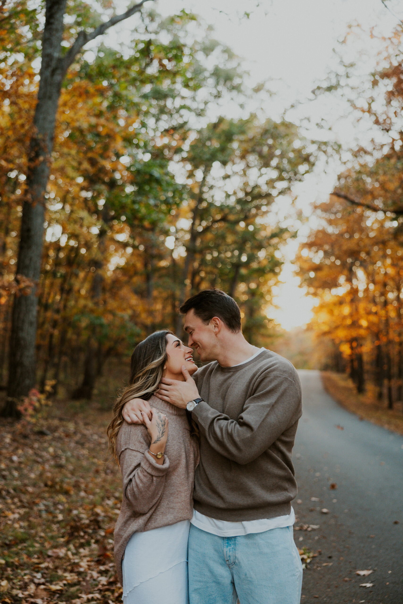 Sweet and romantic couples photos among the fall trees in Northern Virginia